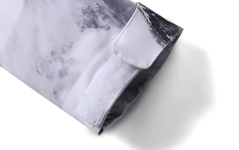 Close-up of SF0569 snowboarding jacket sleeve with waterproof and breathable exterior, highlighting windproof construction for winter sports.