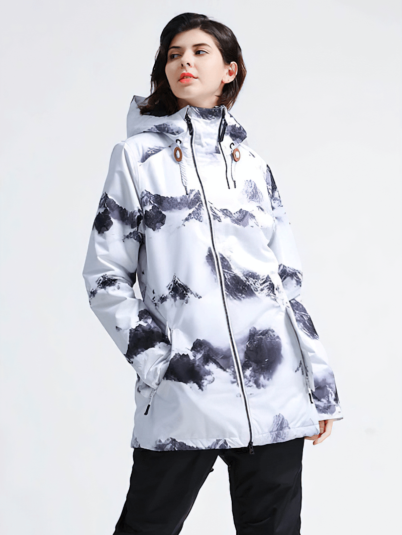 Woman wearing a stylish waterproof skiing jacket, perfect for snowboarding and winter sports.