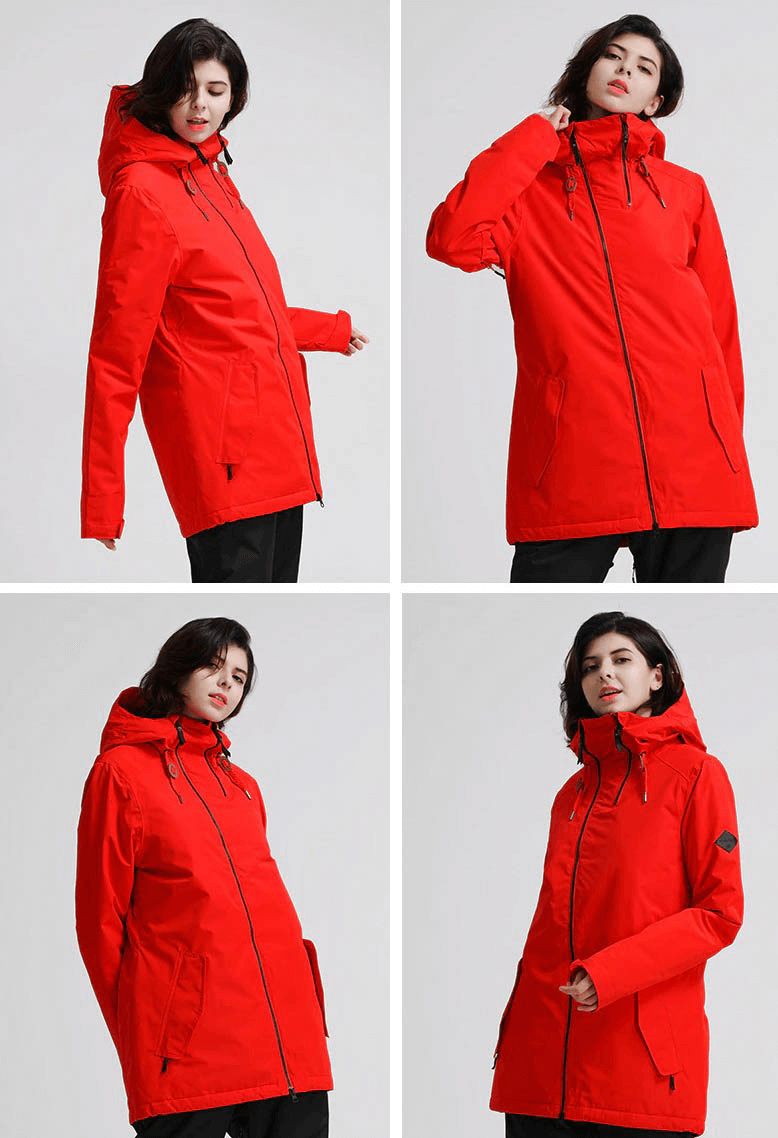 Stylish women in red waterproof snowboarding jacket, perfect for winter sports.