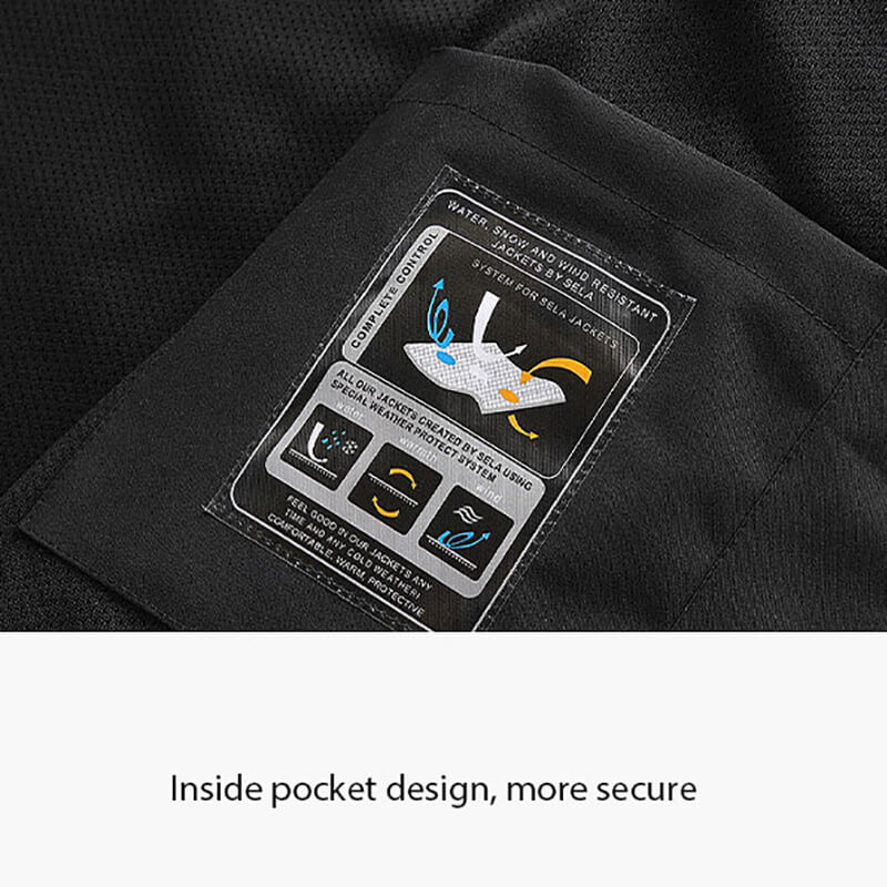 Close-up of black windbreaker's water-resistant label and secure inside pocket design.