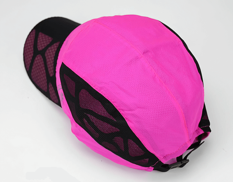Vibrant pink quick-drying baseball cap with breathable mesh panels and adjustable strap, perfect for outdoor sports enthusiasts.