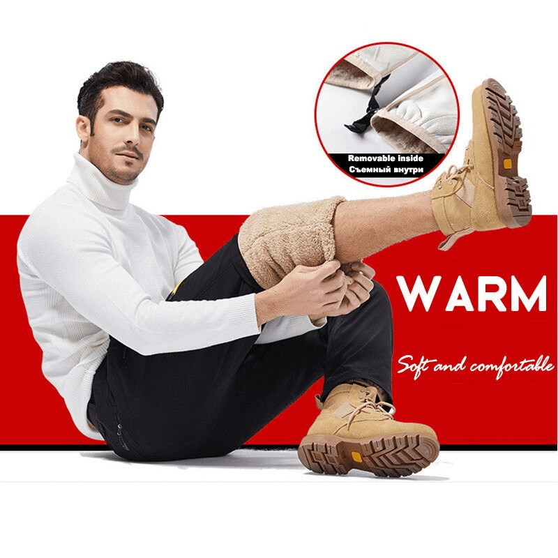 Man wearing outdoor windproof ski pants with removable liner, demonstrating warmth and comfort against a red background.