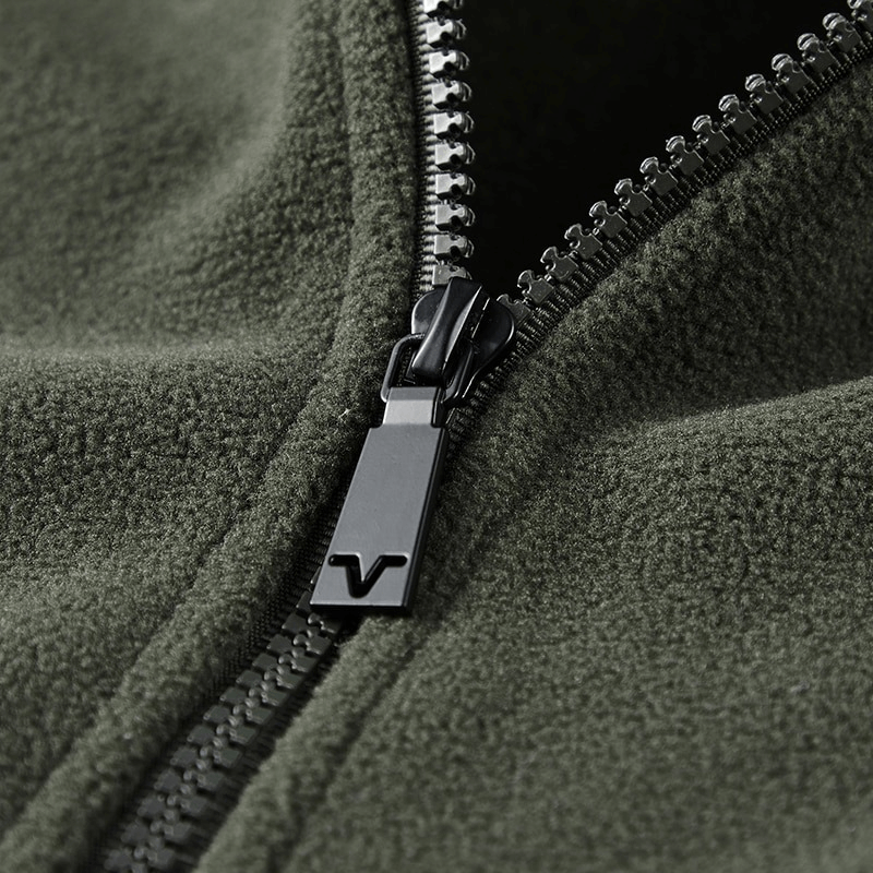 Close-up of the zipper on an Outdoor Zipper Fleece Hiking Jacket for Men, featuring durable fabric and sleek design.