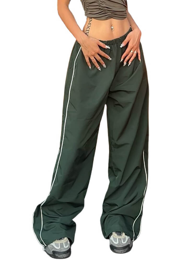 Oversized baggy solid high-waisted sweatpants for women in dark green with pockets, perfect for style and comfort.