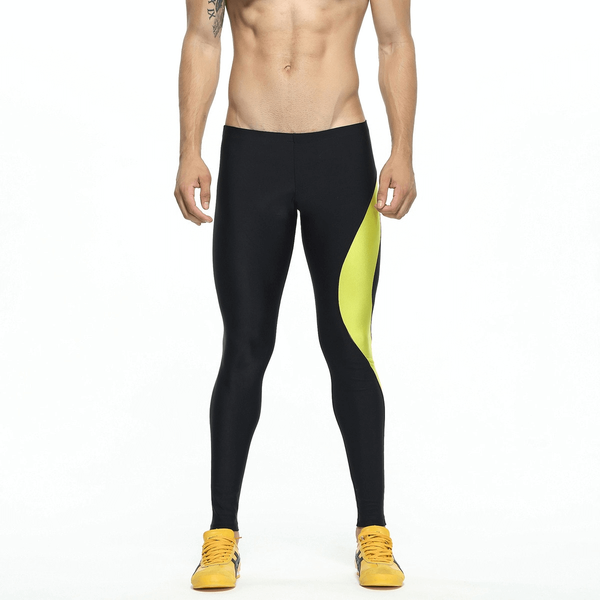 Quick-Drying Compression Running Men's Training Leggings with yellow stripe, perfect for athletes, offering breathable and supportive comfort.