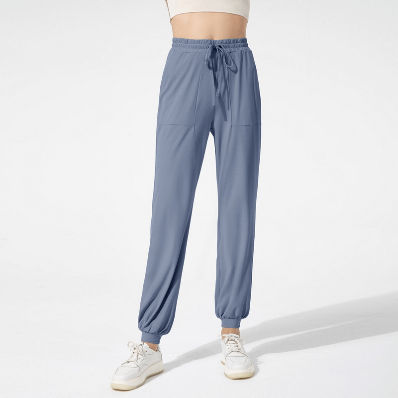 Lightweight quick-drying women's training pants with pockets, perfect for yoga. Features nylon fabric and drawstring, ankle length - SF1262.