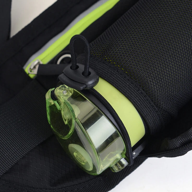 Close-up of black running belt bag with green water bottle holder, ideal for jogging and gym workouts, made of durable nylon.