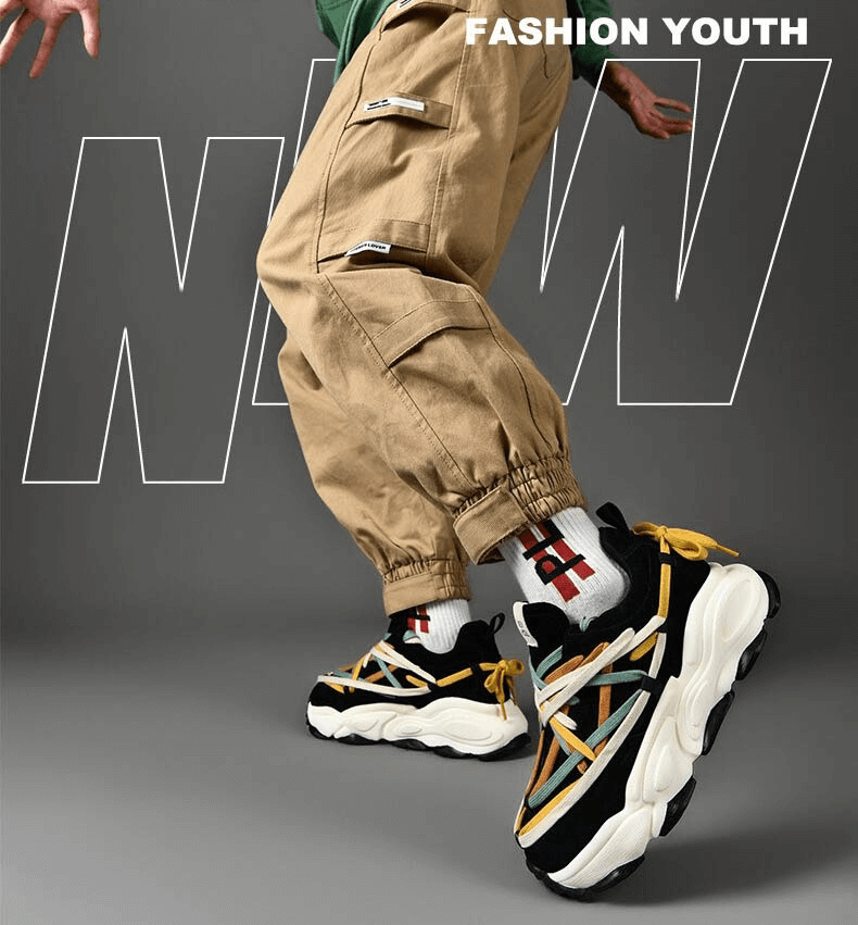 Person wearing running thick bottom leather sneakers with colorful laces, showcasing style and stability. Fashion Youth trend.