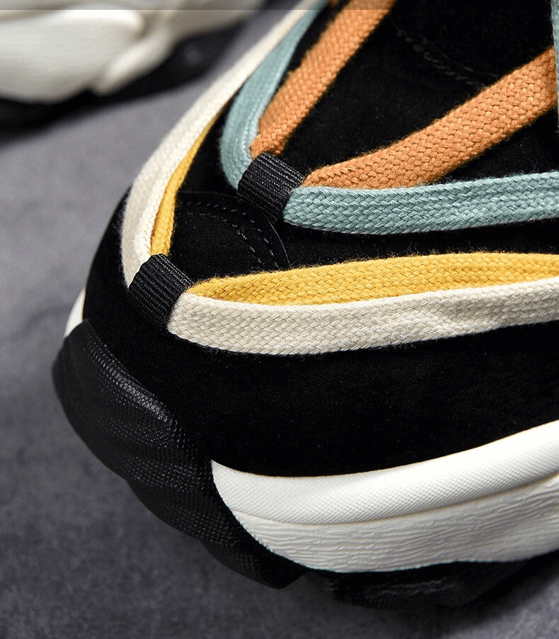 Close-up of running leather sneaker with thick bottom, showcasing colorful laces for unisex design SF0375.