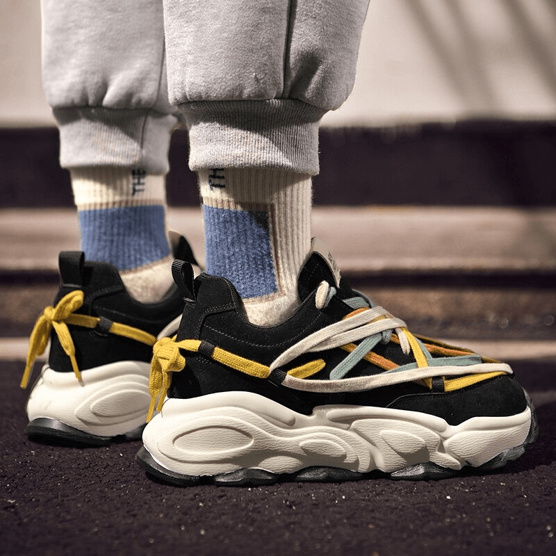 Trendy running sneakers with thick soles and colorful laces, perfect for a stylish and comfortable run in premium leather. SKU: SF0375