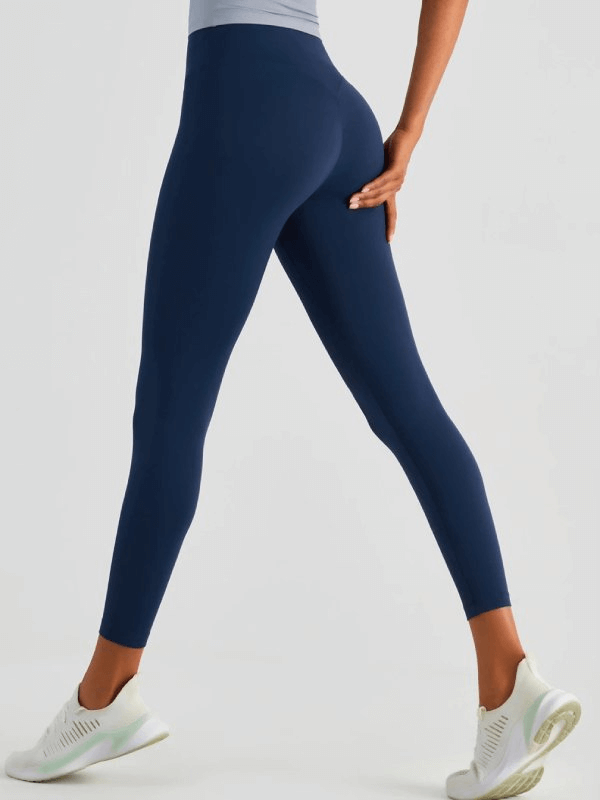 Woman wearing Seamless Breathable Women's Fitness Leggings SF0165, designed for yoga with nylon and spandex for comfort and flexibility.