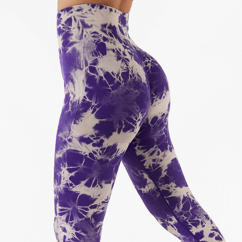 Stylish seamless high waist purple and white leggings for fitness, showcasing side view, ideal for yoga and gym activities.