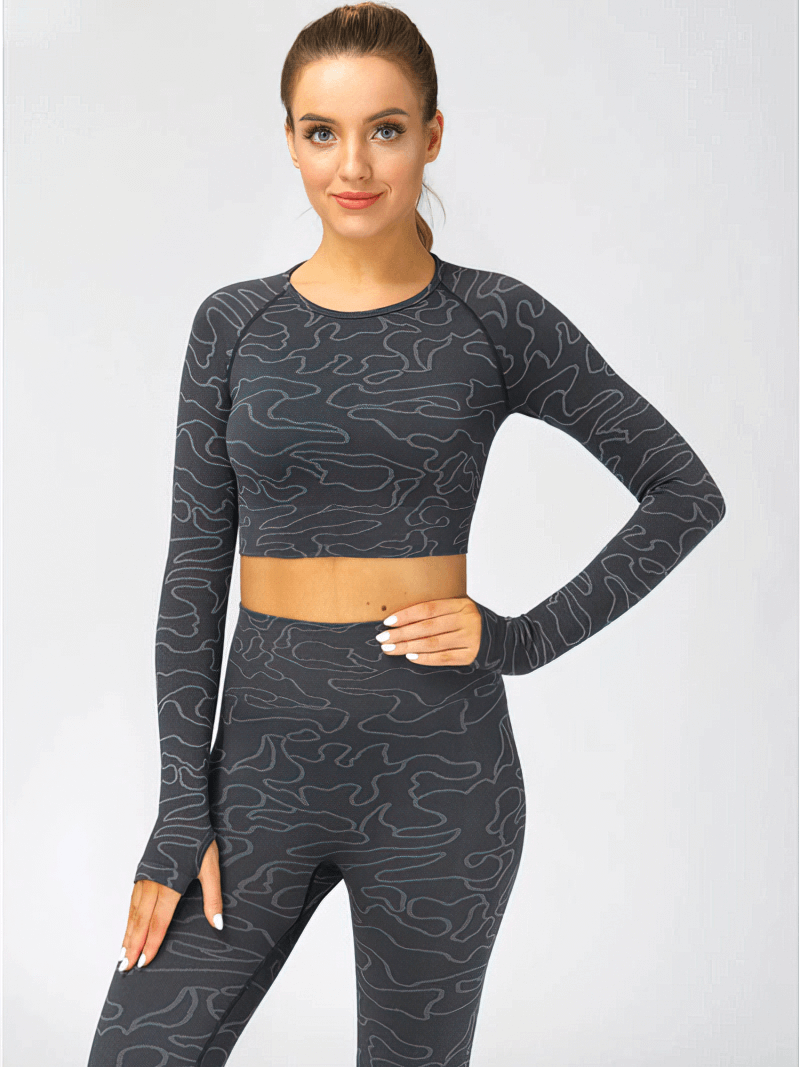 Woman wearing seamless long sleeves training crop top for sports, SF0070, with stylish design, perfect for yoga and running.