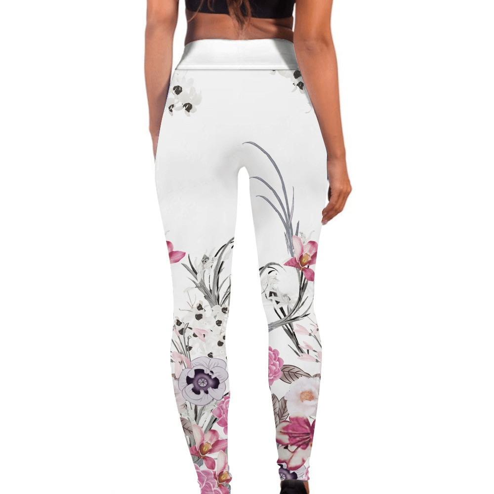 Back view of floral print seamless women's workout leggings, showcasing elastic waist and full-length fit.