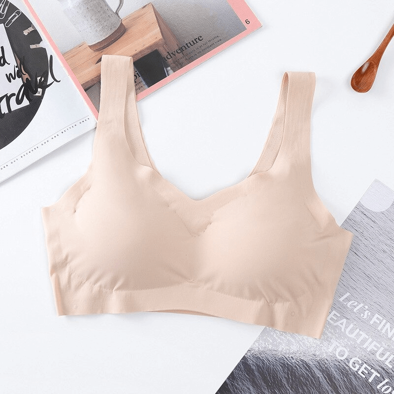Seamless solid color women's sports bra for fitness with padded cups, wire-free design, and adjustable straps. Perfect for workouts. Model SF0450.