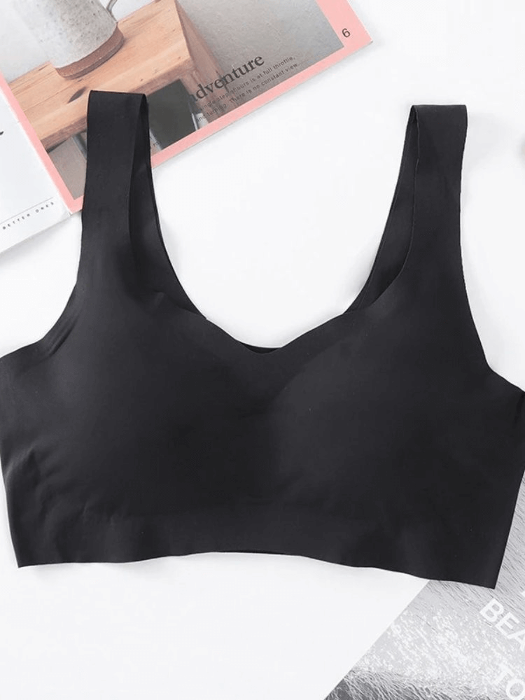 Seamless solid color women's sports bra in black, made of nylon and spandex, perfect for fitness with breathable and padded design.