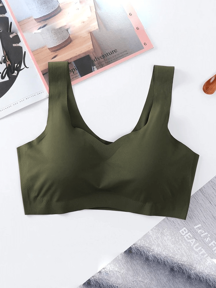 Seamless solid color women's sports bra in green, wire-free, with adjustable straps, perfect for fitness and comfort, model SF0450.