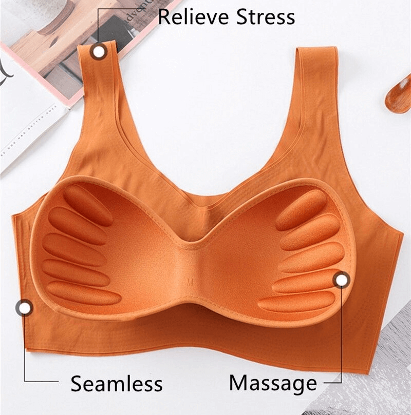 Seamless orange sports bra with padded cups and massage points for stress relief, nylon-spandex blend for women, fitness support.