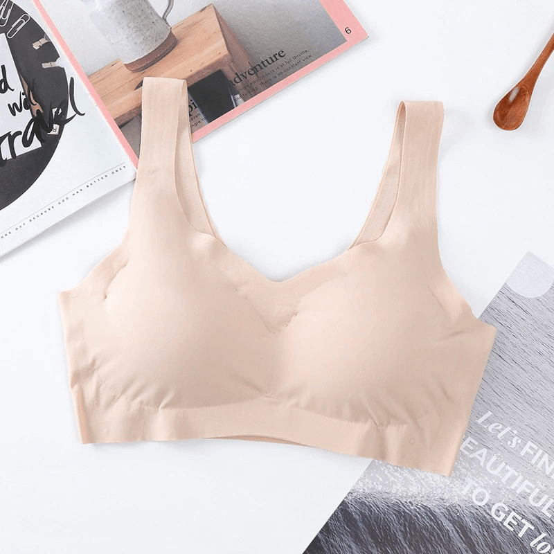 Seamless solid color women's sports bra with adjustable straps, designed for fitness, providing comfort and support. Model SF0450.