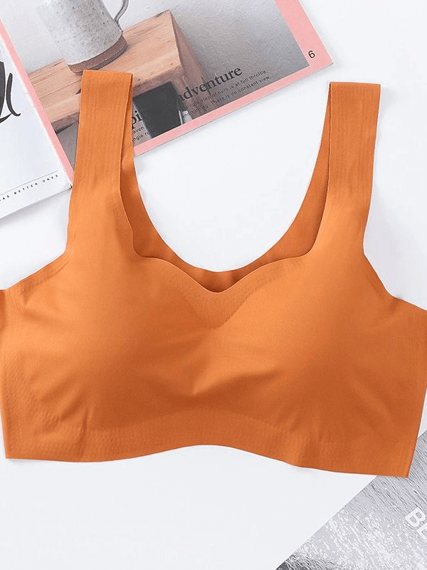 Seamless solid color women's sports bra SF0450 in orange, designed for support and comfort during fitness activities.