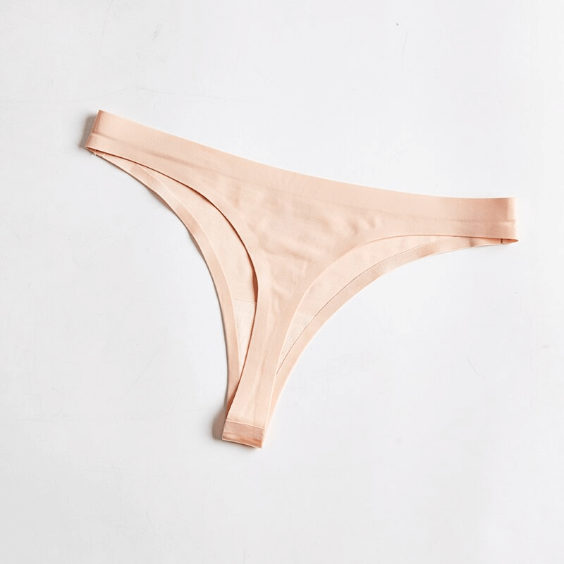 Seamless sports plain women's thong in peach color, elastic and lightweight design, perfect for comfort and style.