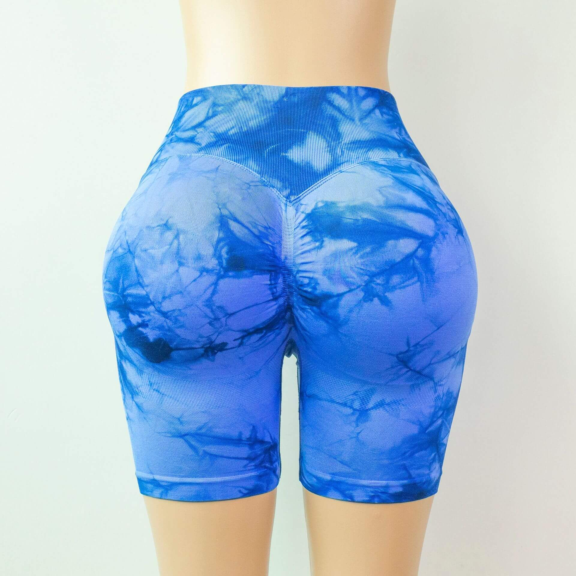 Blue seamless sports scrunch butt shorts for women with high waist, perfect for yoga and comfort. Stylish nylon design.