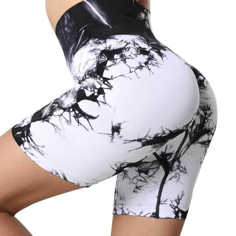 Women's seamless sports scrunch butt shorts in marble pattern, high waist for comfort, perfect for yoga or any active sport.