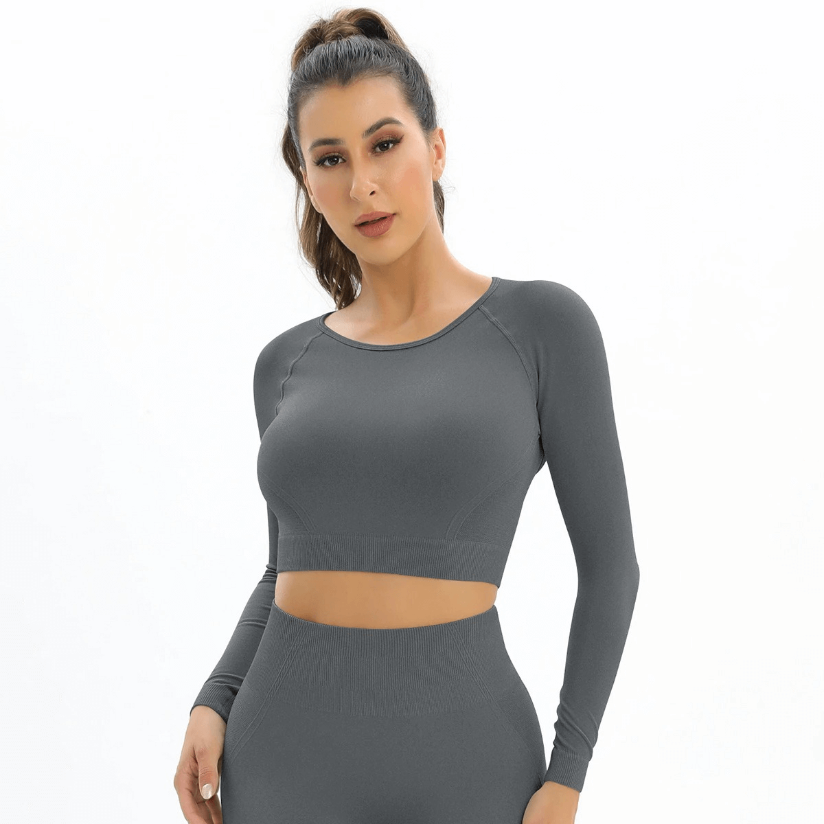 Seamless women's open back yoga top in grey, long sleeve crop top for gym, highlighting comfort and style, SF0051 design.