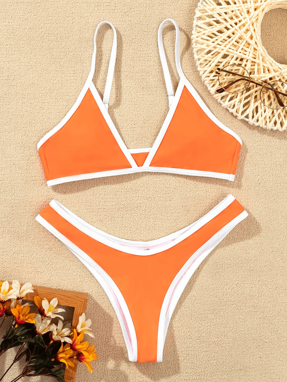Bright orange micro bikini set with adjustable straps, featuring high waist design. Ideal swimwear for women, summer beach ready.
