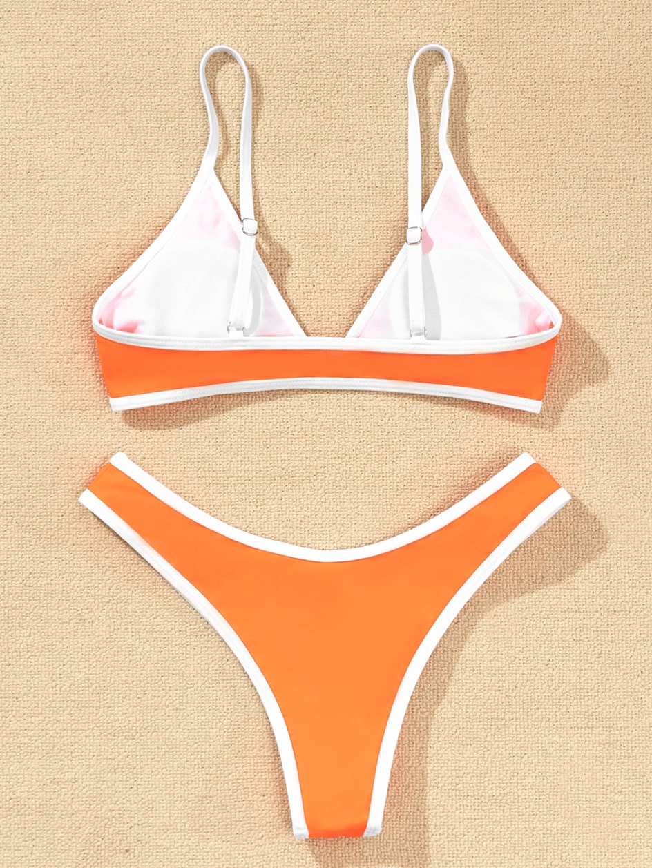Sexy adjustable straps micro bikini set in orange and white, perfect for beach days. Comfortable blend of cotton and spandex.