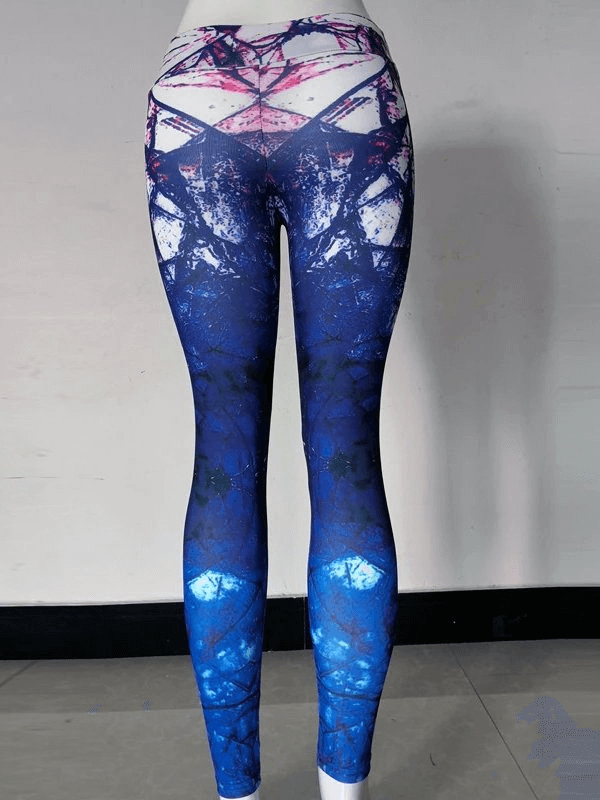 Vibrant high-waisted elastic leggings for fitness, featuring striking blue print and seamless design. Perfect women's sportswear.