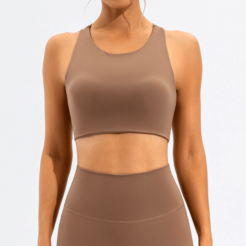 Sexy elastic women's sports bra with open back, workout top in brown. Ideal for fitness, breathable and quick-drying fabric.