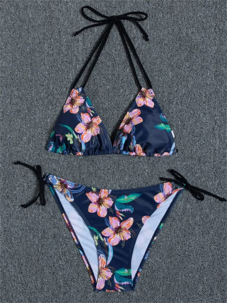 Floral print women's two-piece bikini set with a low waist design, perfect for a stylish beach look.
