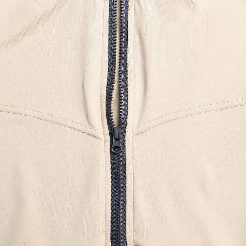 Close-up of beige o-neck bodysuit with zipper detail, showcasing slim fit and fabric texture, perfect for a stylish sports romper look.
