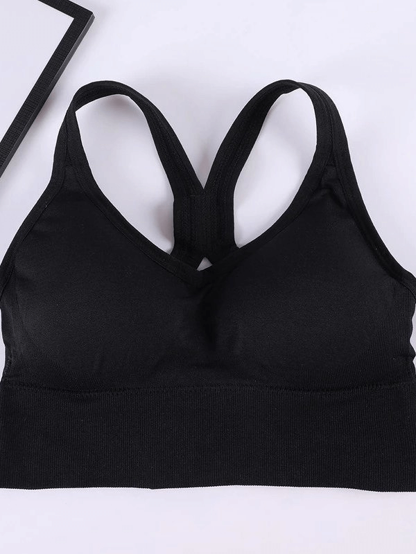 Black push-up sports bra for women, perfect for running. Spandex, Lycra material with back buckle closure. Comfortable and supportive design.