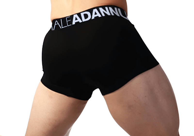 Sexy breathable male panties in black with letter pattern waistband, crafted from cotton and spandex for comfort and performance.