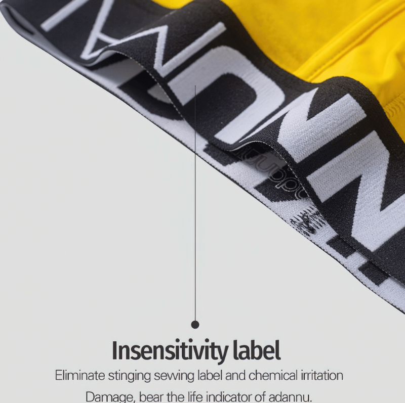 Insensitivity label on yellow breathable cotton underwear, crafted for durability and comfort with stylish black letter pattern waistband.