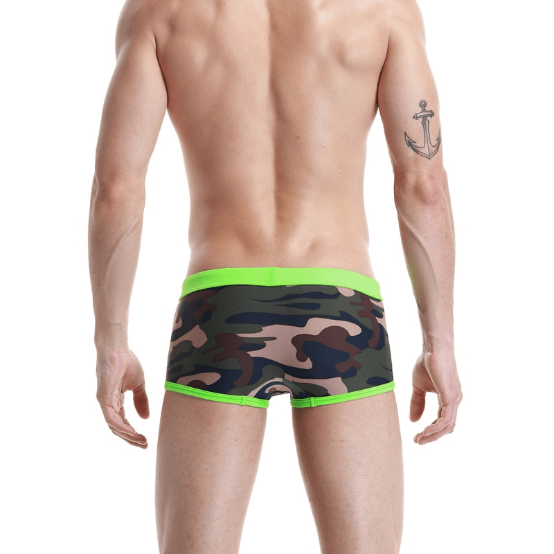 Back view of Sexy Sports Low Waist Camouflage Male Swimming Trunks with green trim, showing durable polyester fabric and stylish design.