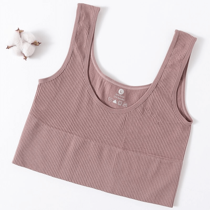 Ribbed seamless tank top for women, perfect for fitness and yoga, in a stylish backless design with high-quality nylon and spandex.