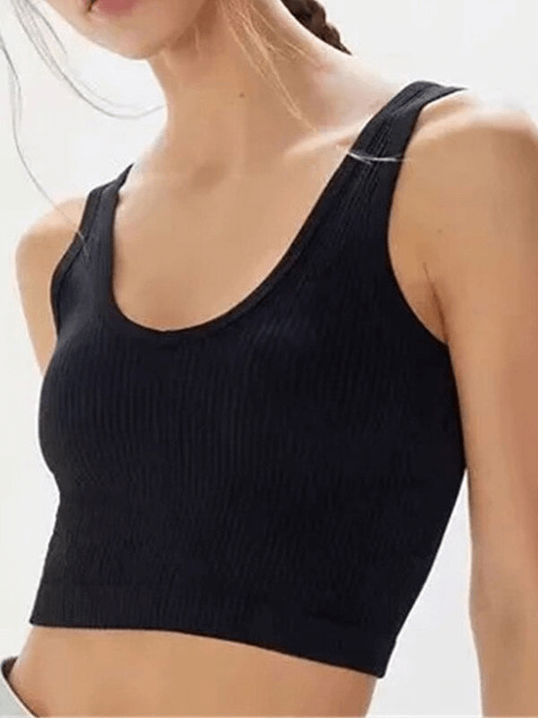 Woman wearing a black ribbed seamless sports tank top, perfect for gym, yoga, or running; stylish and breathable fitness apparel.