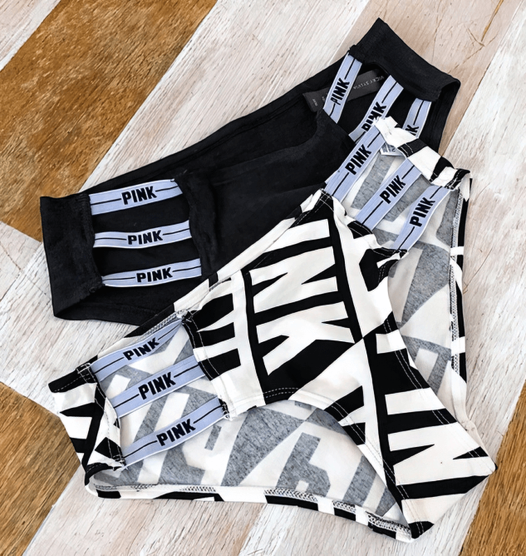Sexy sports women's briefs with side stripes, low-rise design, featuring black and white patterns, made from comfortable cotton materials.