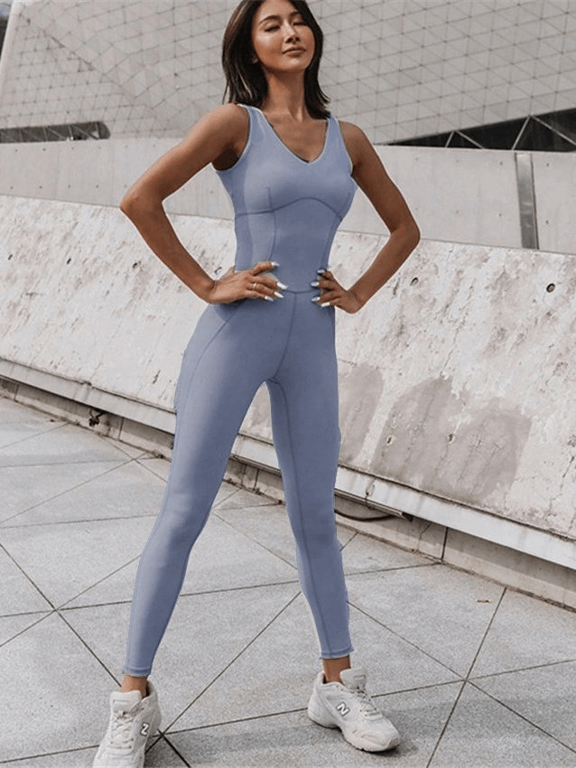 Sexy women's fitness jumpsuit, one-piece elastic yoga suit for sports, stylish solid pattern, breathable and stretchy fabric.