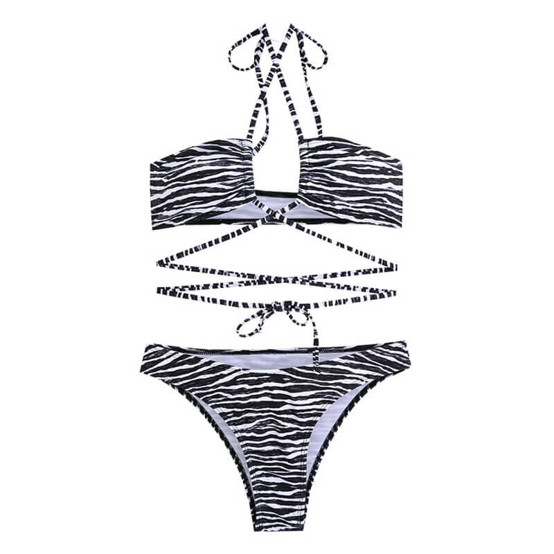 Zebra print women's low waist bikini set with halter top and strappy design, perfect for beach or pool, nylon-spandex blend, SF1013.
