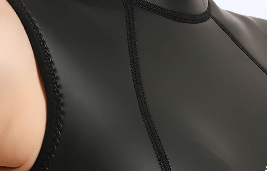 Close-up of black super stretch diving wetsuit bikini with silk-neoprene blend and detailed stitching for optimal comfort and style.