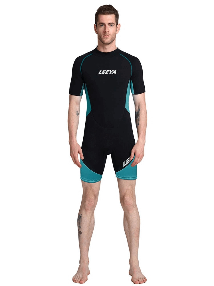 Male short-sleeved black and teal snorkeling surf suit for sun protection and comfort, ideal for water sports.