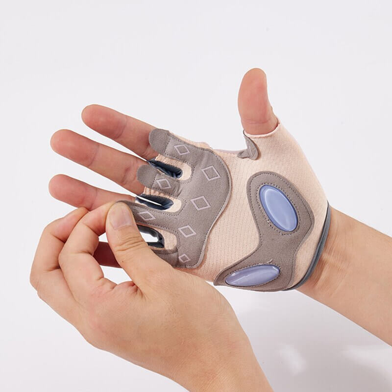 Person wearing silicone anti-shock weight lifting glove, showcasing half-finger design and silicone padding, ideal for gym training.