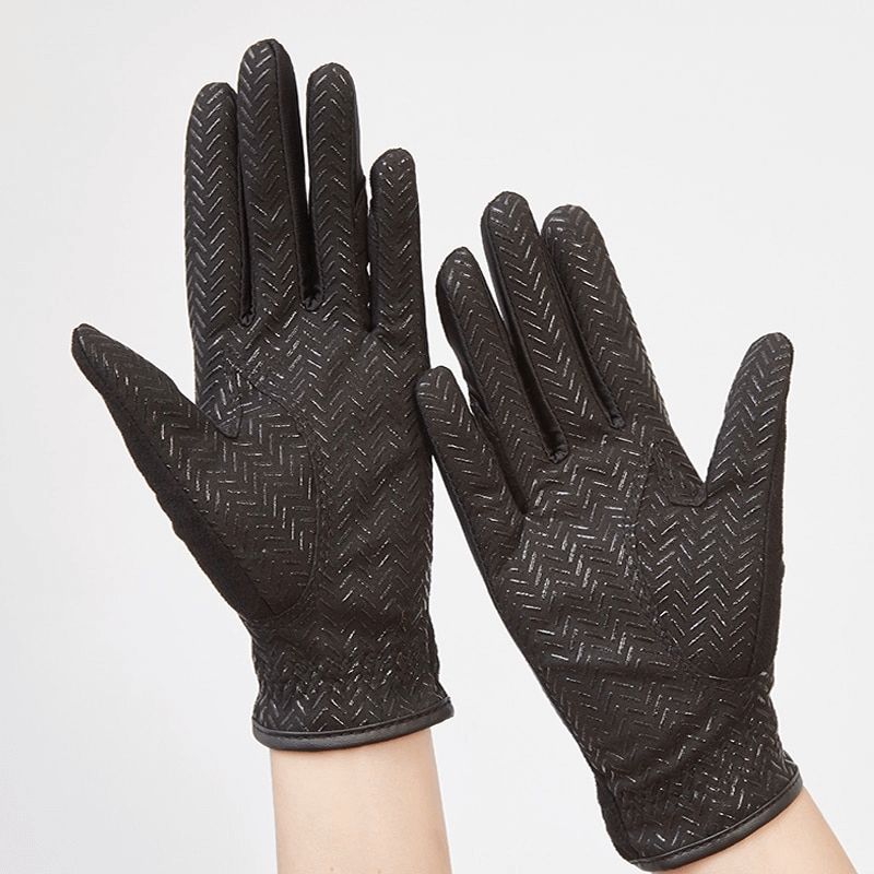 Black silicone non-slip equestrian gloves with Velcro closure, designed for superior grip and control. Lightweight and breathable riding gloves.