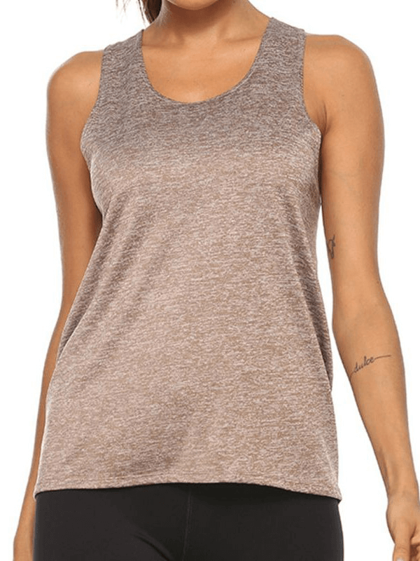 Woman wearing sleeveless fitness top, breathable athletic tank for workouts