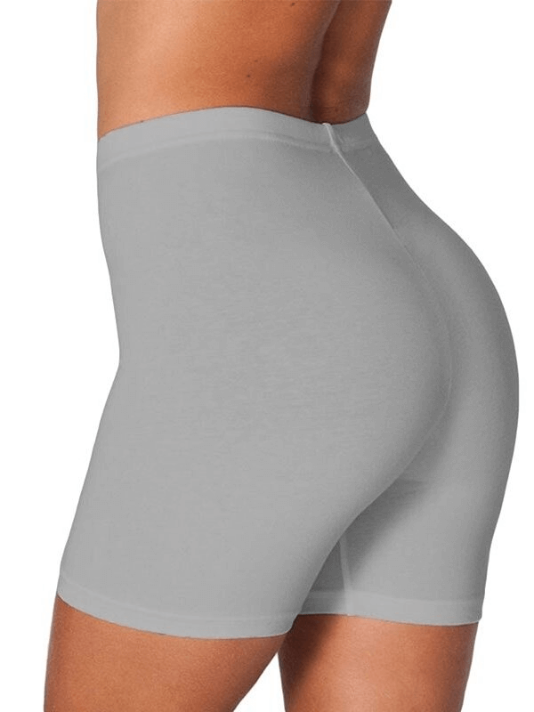 Slim elastic high-waisted women's fitness shorts in gray, showcasing stretchy fabric and secure fit.