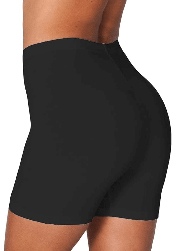 Black high-waisted slim elastic women's shorts designed for fitness, showcasing breathable and stretchy polyester fabric.